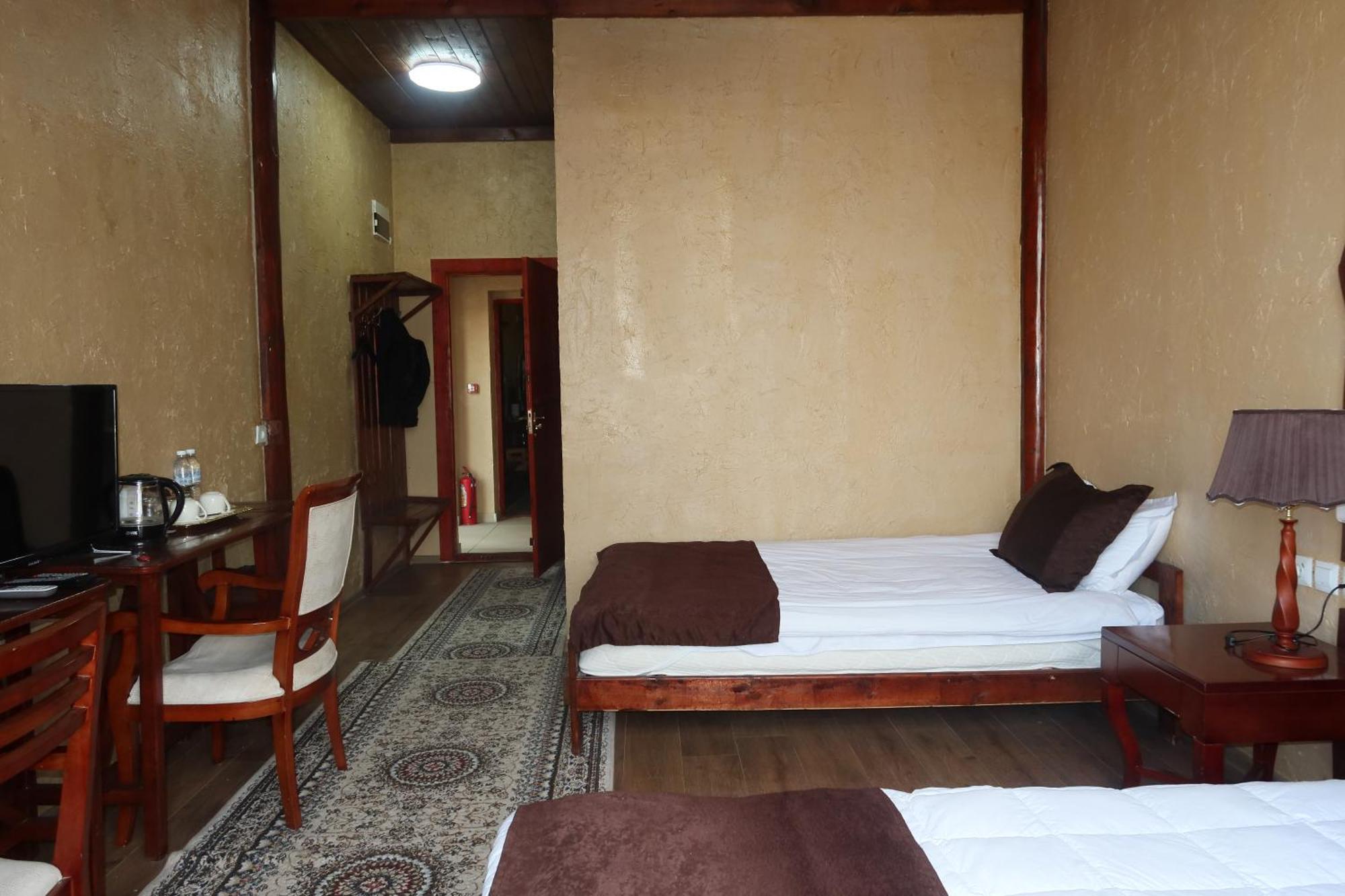 Hotel Sultan Kyzyl-Kia Habitación foto