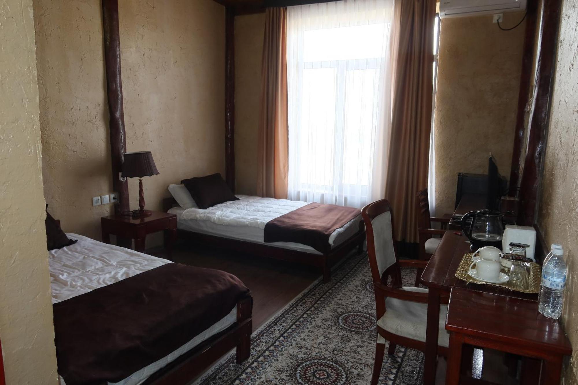 Hotel Sultan Kyzyl-Kia Habitación foto
